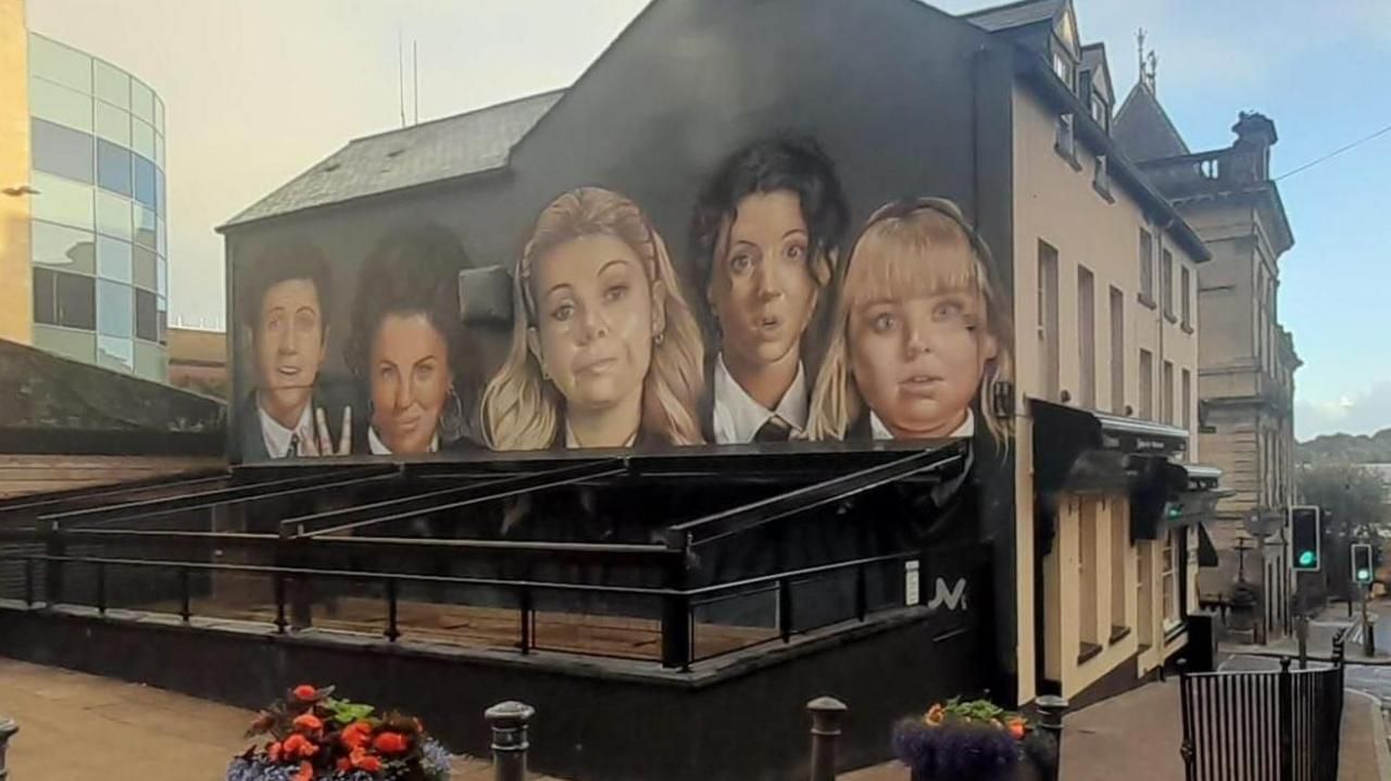 Tourists Divided Over Derry Girls Mural Blocked by Awning